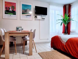 Appartements COSY CASE proche Paris Le Calypso : photos des chambres