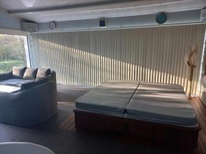 Charmante maison avec spa, sauna et jardin privatif