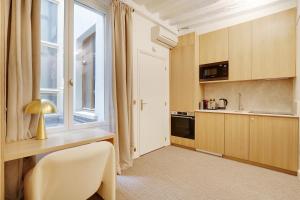 Appartements Pick A Flat's Apartments in Louvre - Rue Saint Honore : photos des chambres