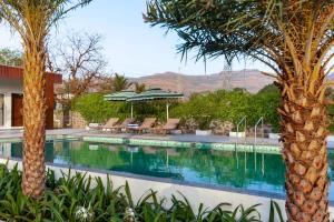 Natures Odyssey by StayVista - Amidst lush greenery with Outdoor pool and Indoor activities