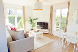 Appartements IDF05 Superbe appart cosy aeroport CDG wifi 4 pers : photos des chambres