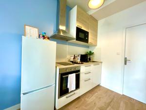 Appartements Le Lagon Bleu - Centre Ville - Maison Boucicaut - BY PRIMO C0NCIERGERIE : photos des chambres