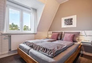 Ferienwohnungen im Kapitänshaus OSTSEEROSE - Gneversdorf