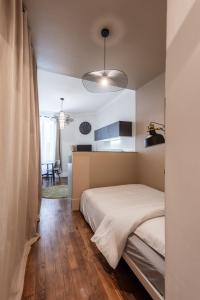 Appartements Le Fournil - 1 min a pieds du centre ville : photos des chambres