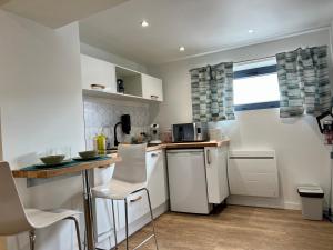 Appartements Charmant studio totalement neuf Beaumont : photos des chambres