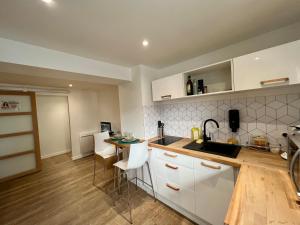 Appartements Charmant studio totalement neuf Beaumont : photos des chambres