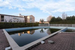 Appartements Joli T2 equipe, tennis, piscine : photos des chambres