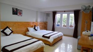 Phòng 3 người - 1 giường Queen 1 giường đơn (Triple - 1 Queen 1 Single)