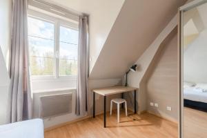 Appartements Paisible appartement dans un cadre verdoyant : photos des chambres