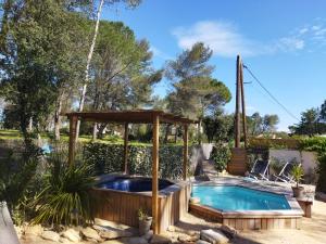 Villas MAISON 5 Personnes EN GARRIGUE - PISCINE-SPA PRIVE : photos des chambres