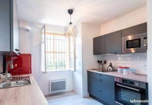 Appartements Domus cesar, wifi, proche gare et arenes : photos des chambres