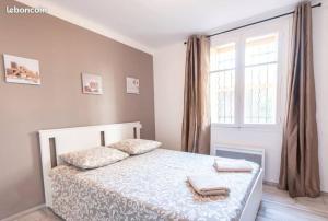 Appartements Domus cesar, wifi, proche gare et arenes : photos des chambres