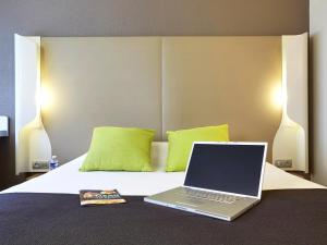 Hotels Campanile Orange Centre sortie 21 sur A7 A9 : photos des chambres