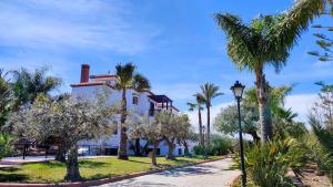 Luxe Haciënda La Campiña met verwarmd zwembad en tennisbaan.