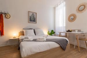 Appartements VilleneuveCityStay - Tropical & Studio Chic : photos des chambres