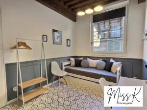 Appartements ''La Fenetre sur le marche'' de Miss.K Conciergerie : photos des chambres