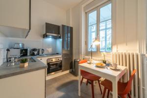 Appartements Le Schuman - Suites en Hyper Centre - Gare - Fibre - RBNB - : photos des chambres