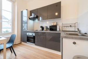 Appartements Le Schuman - Suites en Hyper Centre - Gare - Fibre - RBNB - : photos des chambres