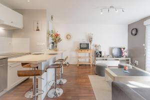 Appartements Spacieux et beau T2 en rez de jardin par Groom* : photos des chambres