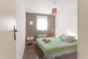 Appartements Spacieux et beau T2 en rez de jardin par Groom* : photos des chambres