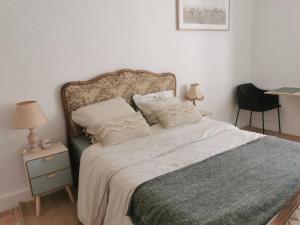 Appartements Au Petit Faubourg : photos des chambres