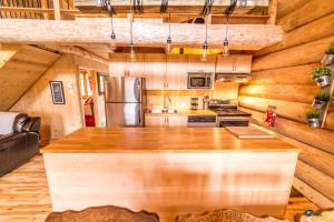 Chalet bois rond aux paysages uniques avec Spa !