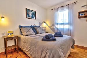 Maisons de vacances LocaLise - M8B - Ty Katell-Roz est une maison de plain-pied avec un terrain entierement clos a quelques pas de la plage et du centre - Wifi inclus - Draps inclus - Animaux bienvenus : photos des chambres