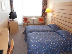Twin Room with Balcony and Lake View room in Hotel Garni Fontana