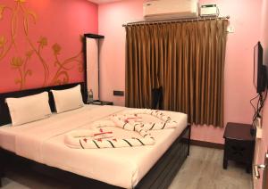 Temple stay - Uma Residency and Guest House