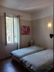 Appartements Appartement LE COURS : photos des chambres