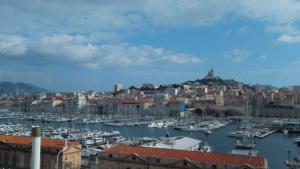 Appartements PETIT BONHEUR Au COEUR DU VIEUX PORT : photos des chambres