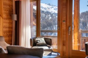 Chalets Chalet Mountainside avec sauna et jacuzzi a 200m des pistes : photos des chambres