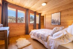 Chalets Chalet Mountainside avec sauna et jacuzzi a 200m des pistes : photos des chambres