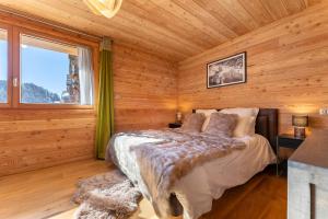 Chalets Chalet Mountainside avec sauna et jacuzzi a 200m des pistes : photos des chambres