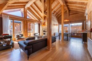 Chalets Chalet Mountainside avec sauna et jacuzzi a 200m des pistes : photos des chambres