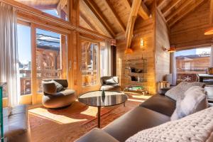 Chalets Chalet Mountainside avec sauna et jacuzzi a 200m des pistes : photos des chambres