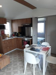 Appartements location mobil home 251 sur un camping haut de gamme : photos des chambres