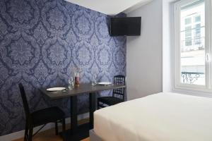 Hotels Hotel Le Petit Duquesne : photos des chambres