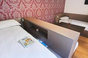 Hotels Hotel Le Petit Duquesne : photos des chambres