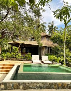 Cabaña junto al mar