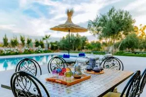 Villa Isaac et Seghir , Casa Lila Gardens Piscine chauffée - Ouguenguemt