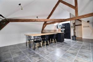 Appartements LOFT renove dans corps de ferme : photos des chambres