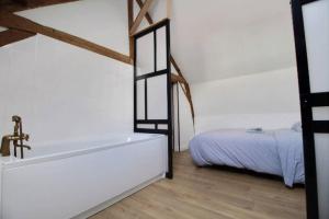 Appartements LOFT renove dans corps de ferme : photos des chambres