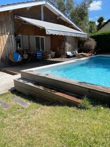 Villas Maison cabane proche ocean/bassin !!! : photos des chambres