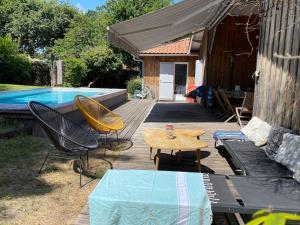 Villas Maison cabane proche ocean/bassin !!! : photos des chambres