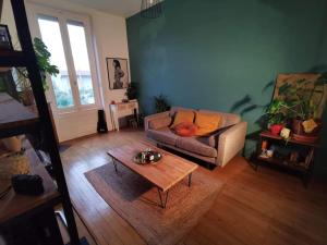 Appartements Charmant T2 avec jardin commun : photos des chambres