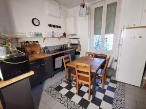 Appartements Charmant T2 avec jardin commun : photos des chambres