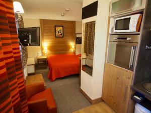 Appartements RisoulSki Antares - Piscine et Sauna : photos des chambres
