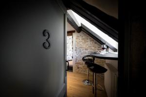 Appartements Maison du colombier : photos des chambres