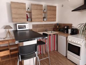 Appartements Studio du clocher : photos des chambres